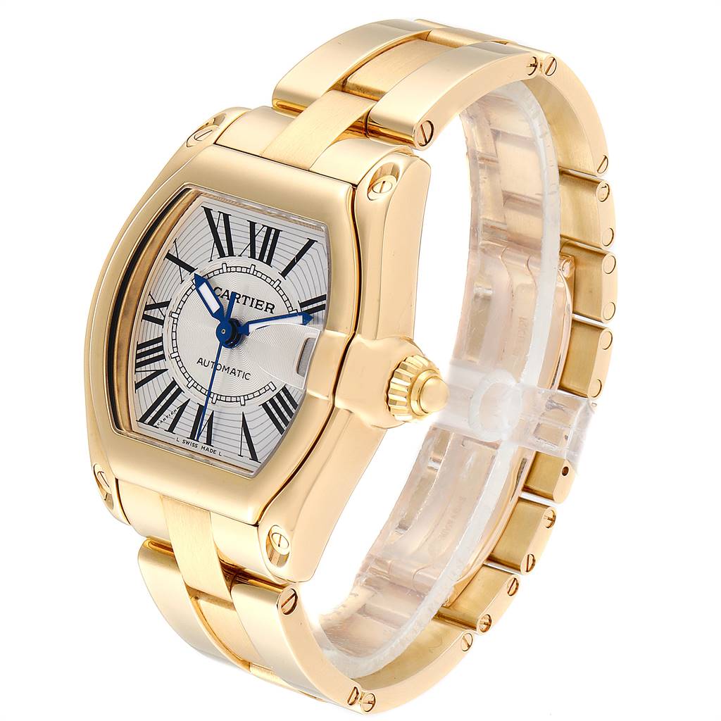 The Cartier Roadster W62005V1 Men's Yellow Gold Silver Dial W62005V1 Men's Yellow Gold Silver Dial watch is shown at a three-quarter angle, displaying the face, crown, and bracelet.