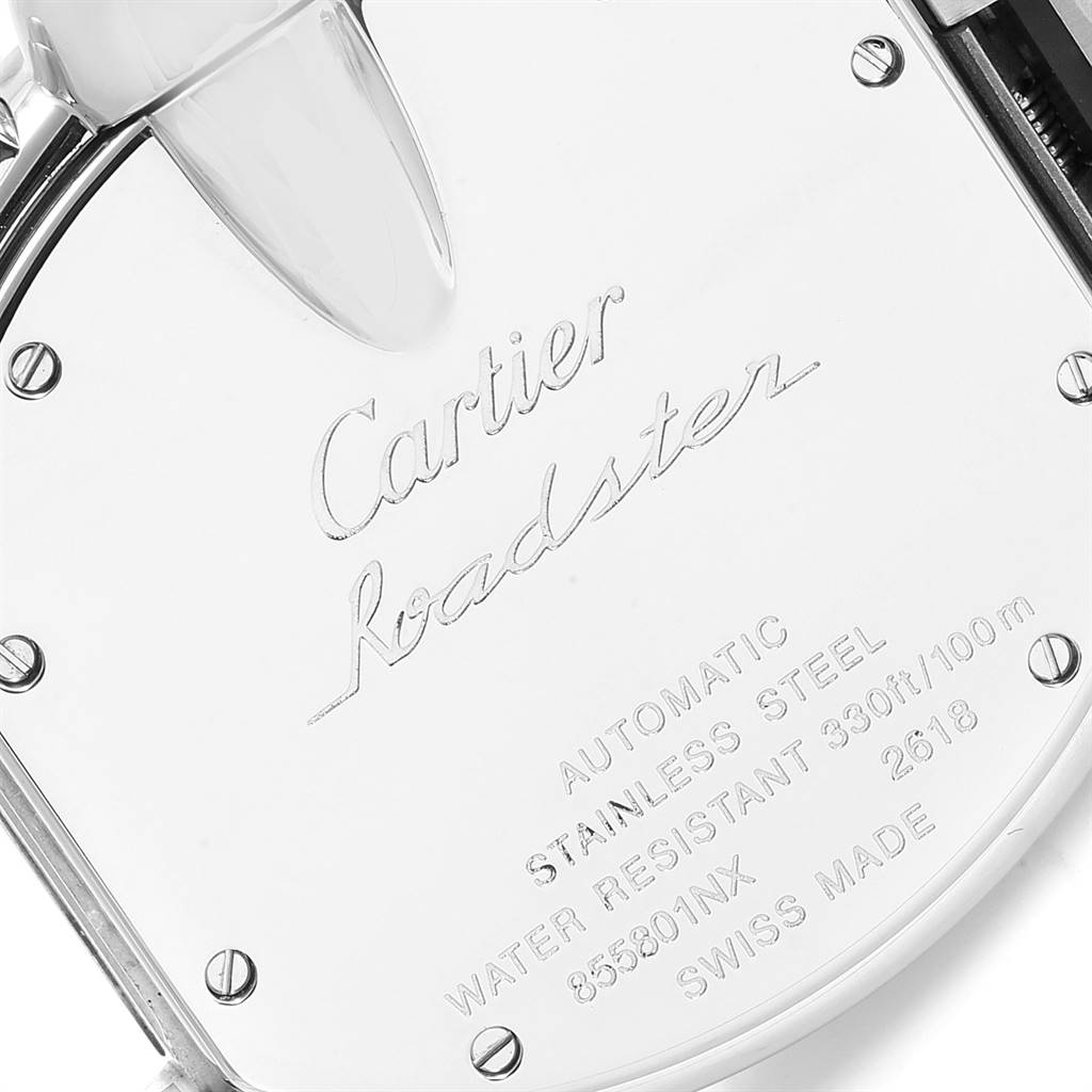 The image shows a close-up of the back case of a Cartier Roadster W62019X6 Men
s Stainless Steel Silver Dial W62019X6 Men
s Stainless Steel Silver Dial watch, detailing the inscriptions and screws.