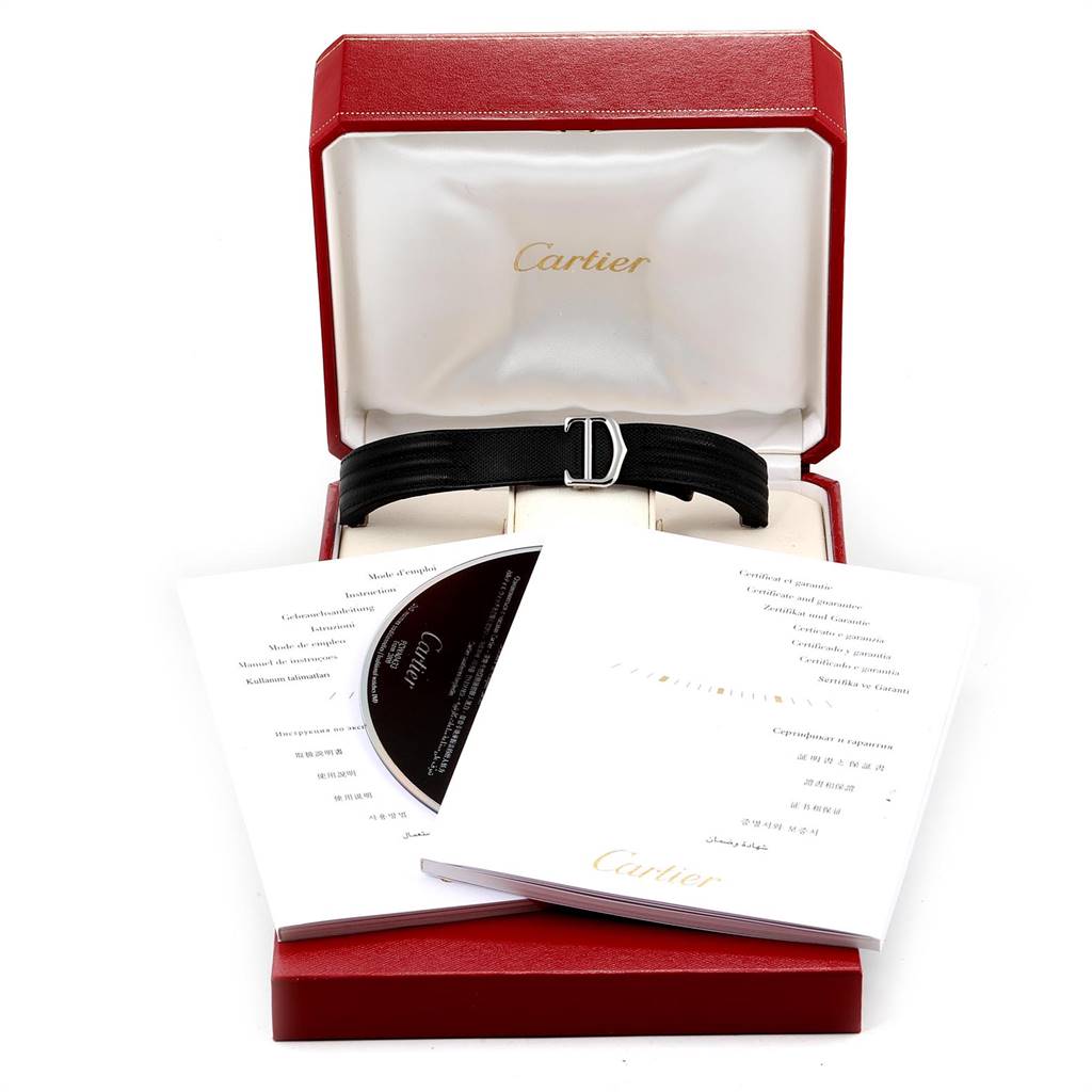 The image shows a Cartier Roadster W62019X6 Men
s Stainless Steel Silver Dial W62019X6 Men
s Stainless Steel Silver Dial watch strap and manuals inside an open red Cartier box.