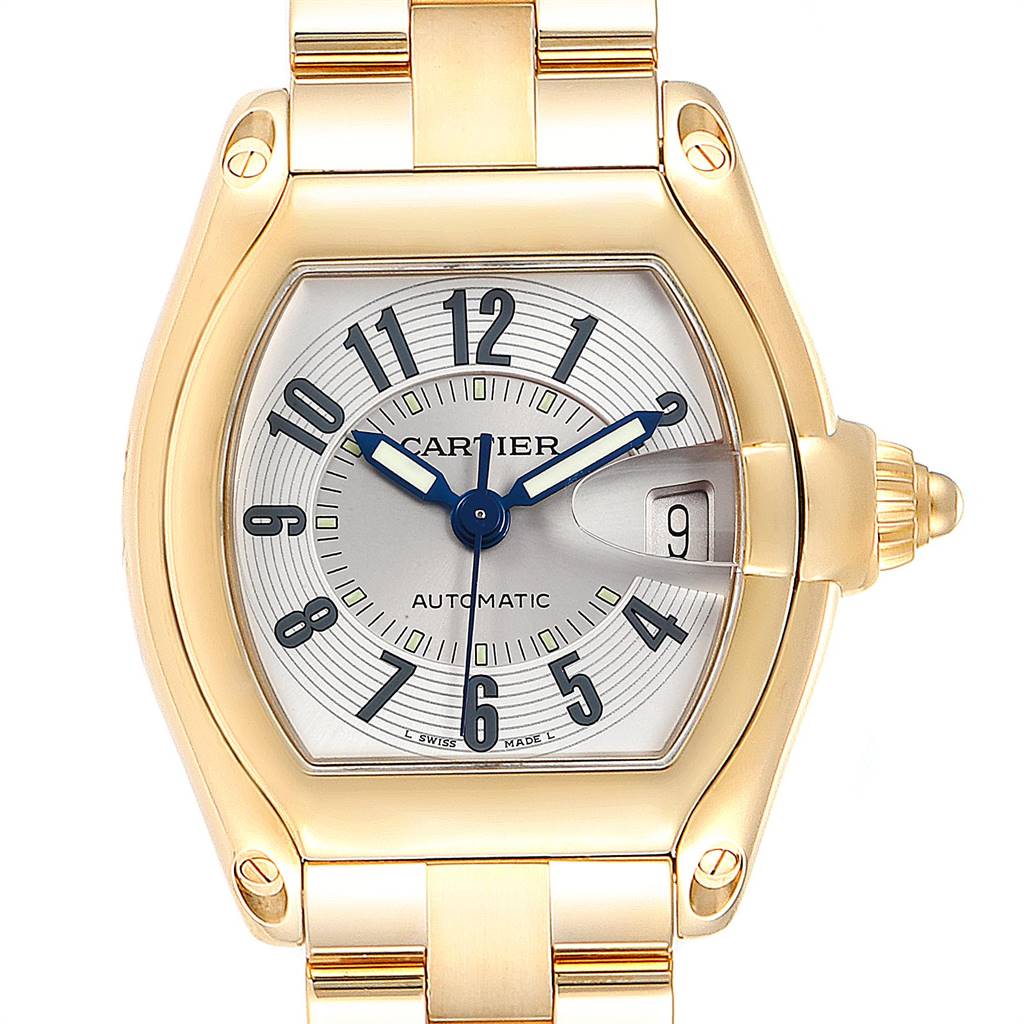 The Cartier Roadster W62003V1 Men
s Yellow Gold Silver Dial W62003V1 Men
s Yellow Gold Silver Dial watch is shown from a frontal angle, displaying the dial, hands, date window, and part of the bracelet.