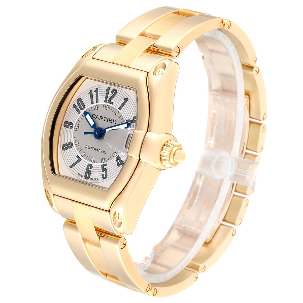 The image shows a side view of the Cartier Roadster W62003V1 Men
s Yellow Gold Silver Dial W62003V1 Men
s Yellow Gold Silver Dial watch, highlighting its gold case, bracelet, and dial.