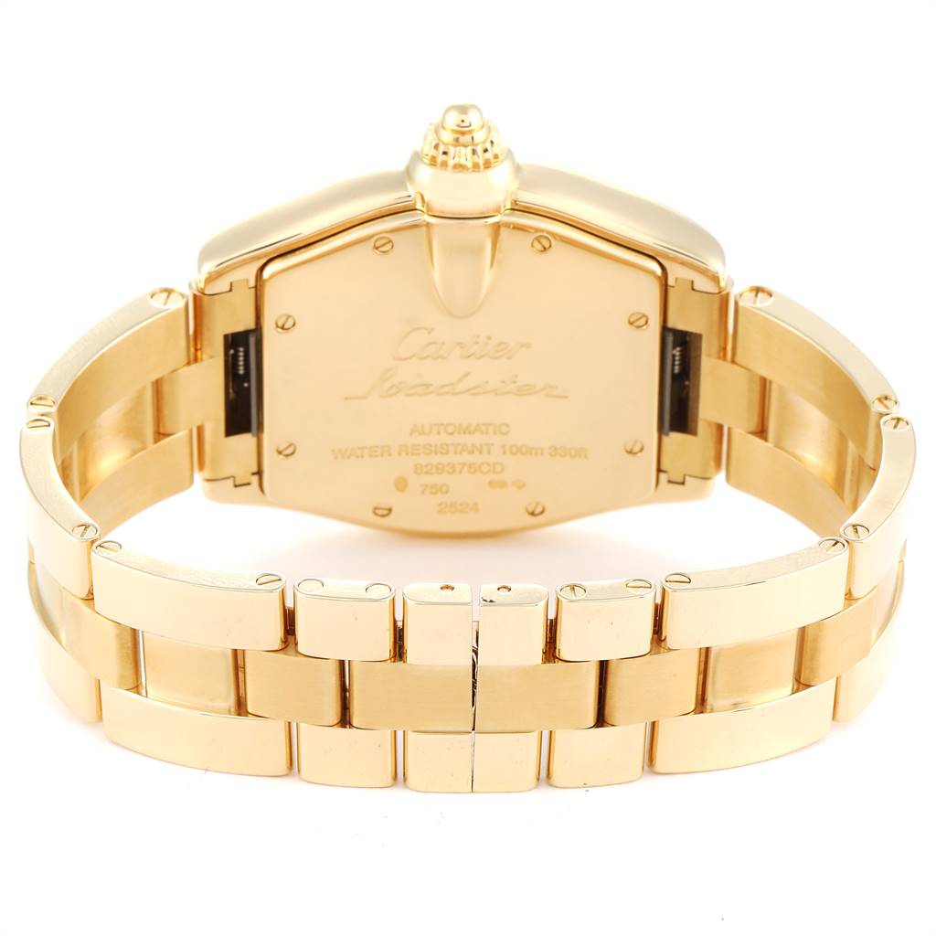 The image shows the back case and gold bracelet of a Cartier Roadster W62003V1 Men
s Yellow Gold Silver Dial W62003V1 Men
s Yellow Gold Silver Dial watch from a rear angle.