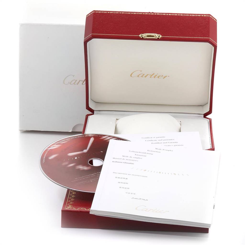 The image shows the packaging, manual, CD, and paperwork for the Cartier Roadster W62002V3 Men
s Stainless Steel Black Dial W62002V3 Men
s Stainless Steel Black Dial model watch.