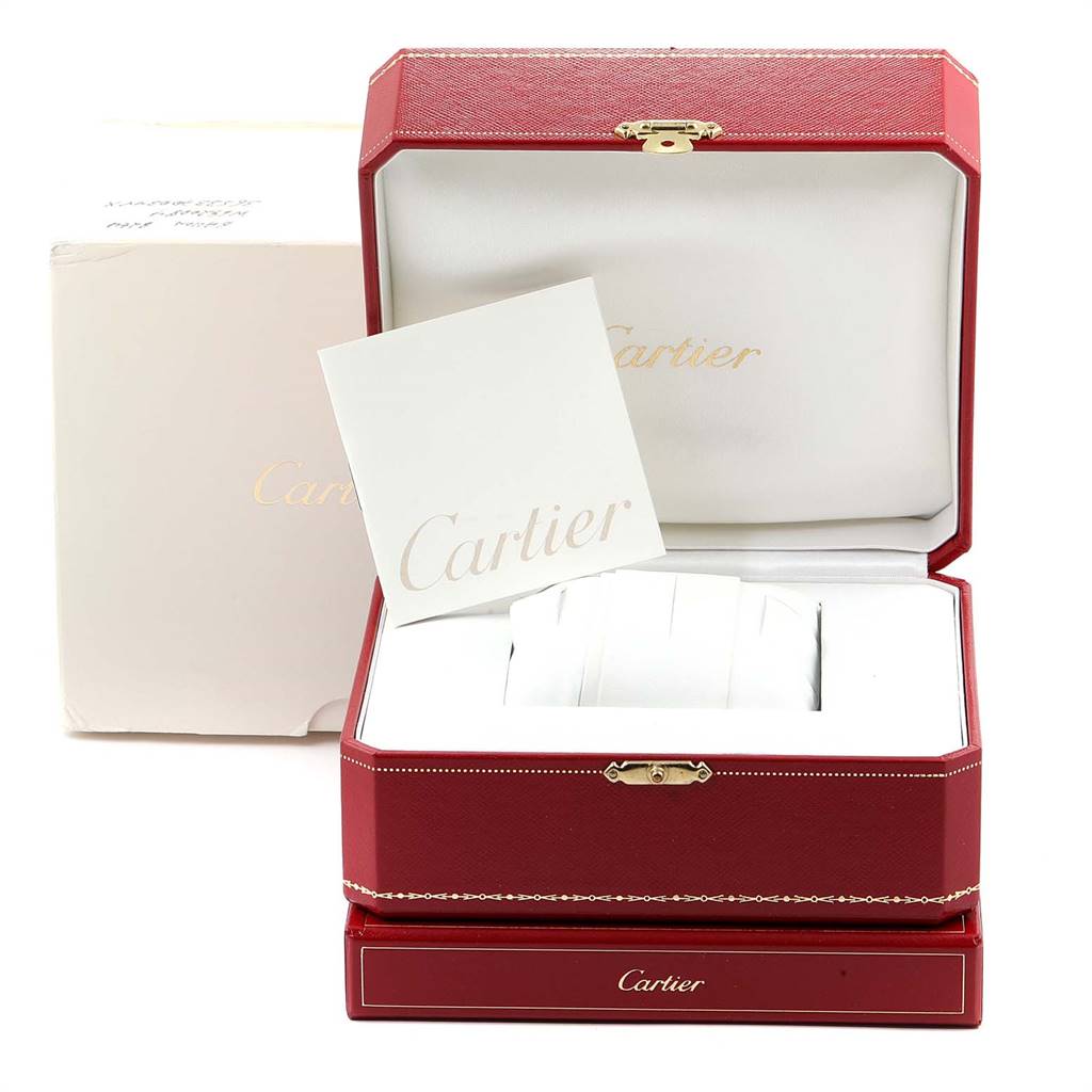 The image shows the open box for a Cartier Roadster W62021Y3 Men's Yellow Gold Champagne Dial W62021Y3 Men's Yellow Gold Champagne Dial watch containing a pillow cushion and documentation.