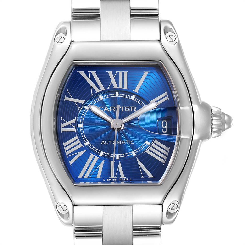 This image shows a close-up of the Cartier Roadster W62048V3 Men's Stainless Steel Blue Dial W62048V3 Men's Stainless Steel Blue Dial model watch, featuring the face, bezel, and a portion of the strap.