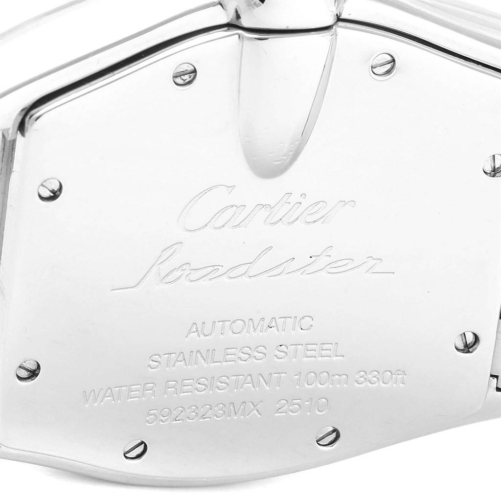 This image shows the back case of the Roadster model by Cartier, displaying engravings and screws.