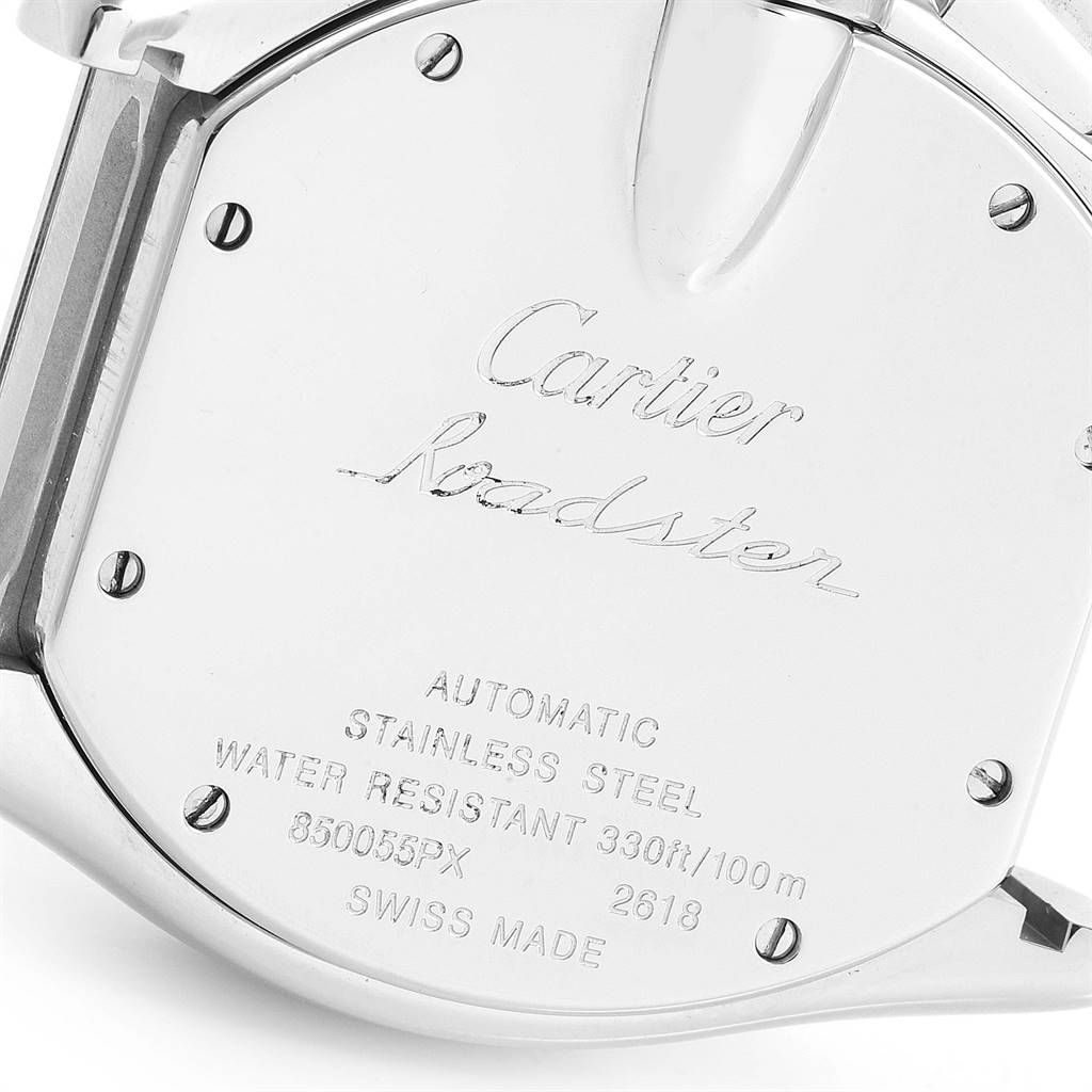 The image shows the back case of the Cartier Roadster W62019X6 Men
s Stainless Steel Silver Dial W62019X6 Men
s Stainless Steel Silver Dial watch, highlighting its engravings and screws.