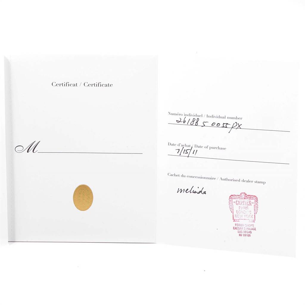 The image shows the certificate of Best Quality
ity and dealer stamp for a Cartier Roadster W62019X6 Men
s Stainless Steel Silver Dial W62019X6 Men
s Stainless Steel Silver Dial model watch.