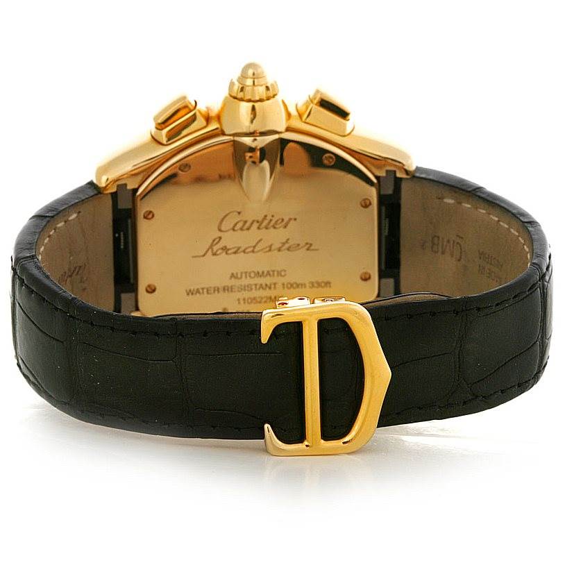 The image shows the back and clasp of a Cartier Roadster W62021Y2 Men's Yellow Gold Silver Dial W62021Y2 Men's Yellow Gold Silver Dial watch, featuring a leather strap and gold detailing.