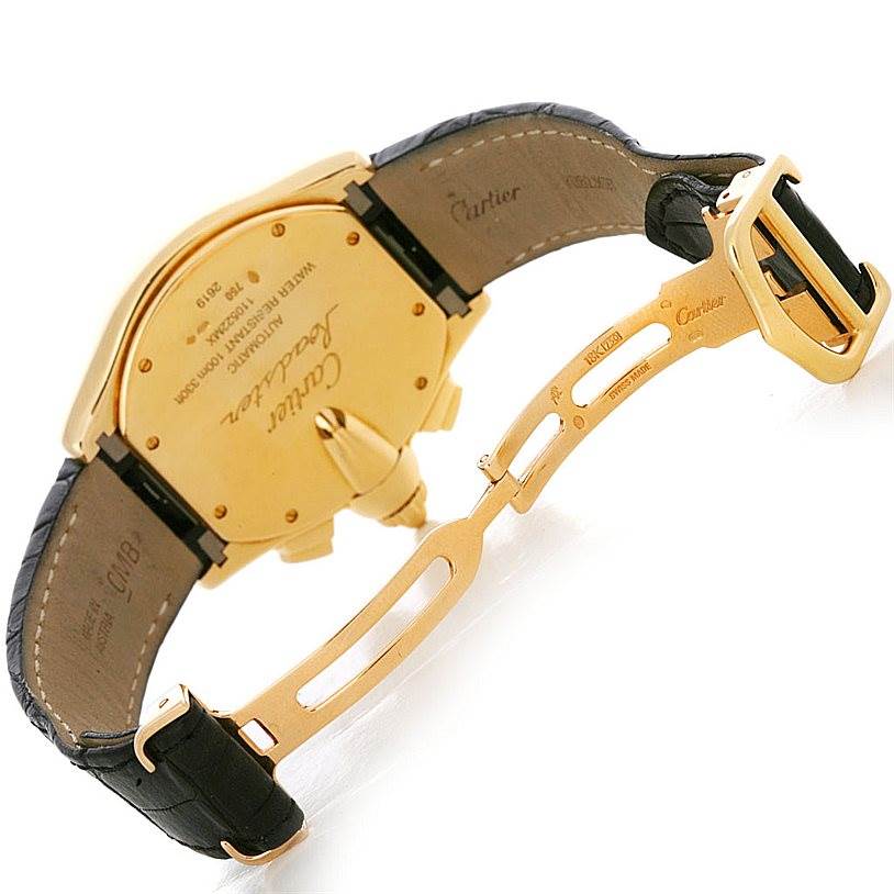 The image shows the back case and partially opened clasp of the Cartier Roadster W62021Y2 Men's Yellow Gold Silver Dial W62021Y2 Men's Yellow Gold Silver Dial watch with a leather strap.