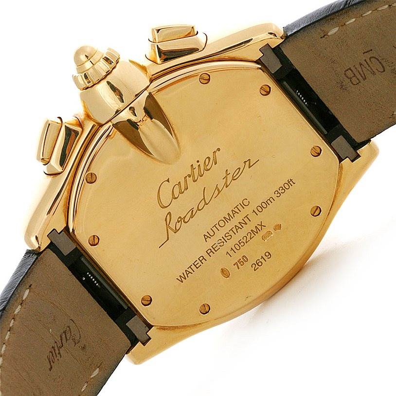 The image shows the back of a Cartier Roadster W62021Y2 Men's Yellow Gold Silver Dial W62021Y2 Men's Yellow Gold Silver Dial watch, highlighting its automatic movement, water resistance, and model details.