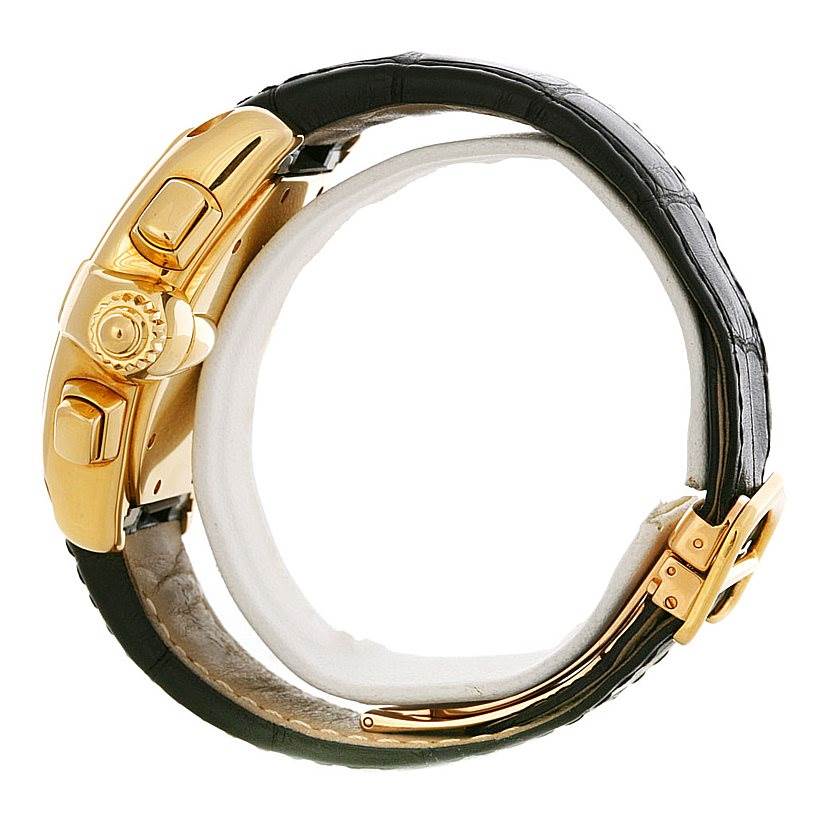 The Cartier Roadster W62021Y2 Men's Yellow Gold Silver Dial W62021Y2 Men's Yellow Gold Silver Dial watch is shown from a side angle focusing on the crown, pushers, and a portion of the strap and buckle.