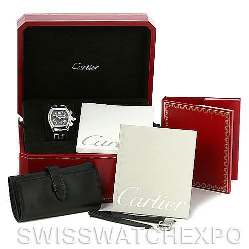 The image shows a Cartier Roadster W62020X6 Men's Stainless Steel Black Dial W62020X6 Men's Stainless Steel Black Dial watch with its accessories, including the original box, manuals, and additional case shown from the front angle.