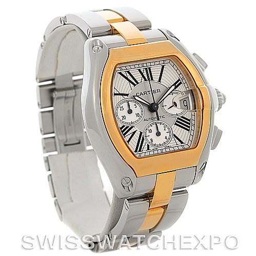 The image shows a Cartier Roadster W62027Z1 Men's Steel and Gold (two tone) Silver Dial W62027Z1 Men's Steel and Gold (two tone) Silver Dial model watch from a three-quarter view, highlighting the dial, bezel, and bracelet.