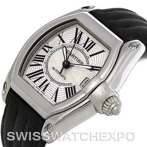 The image shows a close-up of the Cartier Roadster W62025V3 Men
s Stainless Steel Silver Dial W62025V3 Men
s Stainless Steel Silver Dial watch, including its white dial, Roman numerals, and black leather strap.