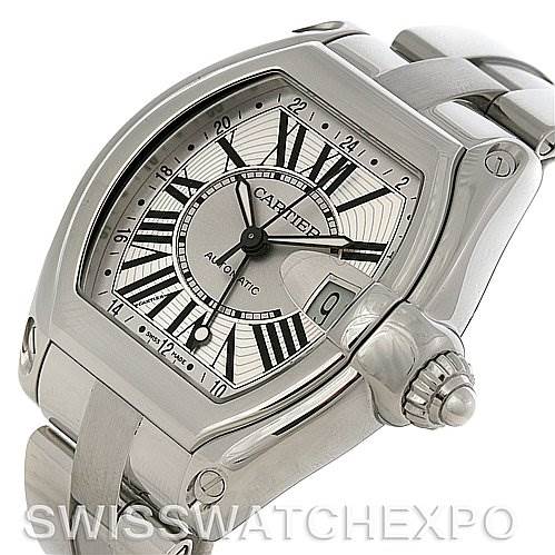 The image shows a close-up of a Cartier Roadster W62032X6 Men's Stainless Steel Silver Dial W62032X6 Men's Stainless Steel Silver Dial watch displaying its face, crown, and part of its bracelet at a slight angle.