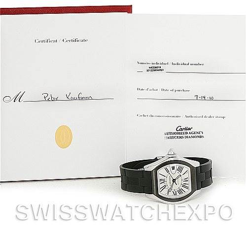 The image shows a Cartier Roadster W6206018 Men's Stainless Steel Silver Dial W6206018 Men's Stainless Steel Silver Dial watch displayed along with its certificate and red packaging, at an eye-level angle.