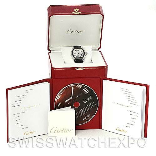The Cartier Roadster W6206018 Men's Stainless Steel Silver Dial W6206018 Men's Stainless Steel Silver Dial watch is shown in its open box with accessories, including a DVD and manuals displayed around it.