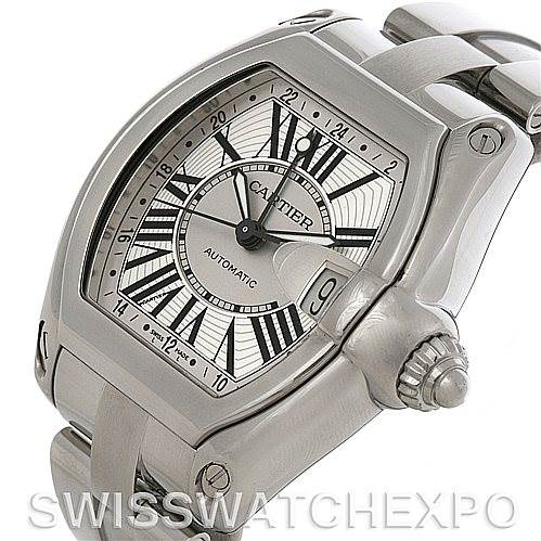 The image shows a close-up angled view of the Cartier Roadster W62032X6 Men's Stainless Steel Silver Dial W62032X6 Men's Stainless Steel Silver Dial watch, highlighting the dial, bezel, and part of the bracelet.