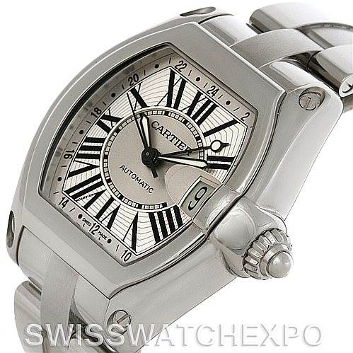 This image shows a Cartier Roadster W62032X6 Men's Stainless Steel Silver Dial W62032X6 Men's Stainless Steel Silver Dial watch at an angle highlighting the dial, crown, and part of the stainless steel bracelet.
