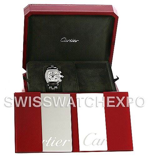 The image shows a Cartier Roadster W62019X6 Men's Stainless Steel Silver Dial W62019X6 Men's Stainless Steel Silver Dial watch and its accessories from a front angle, inside an open red Cartier box.