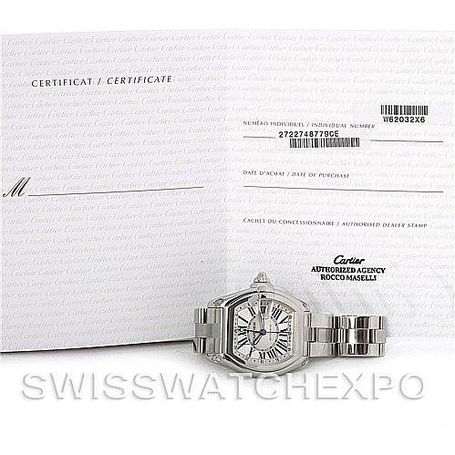 A Cartier Roadster W62032X6 Men's Stainless Steel Silver Dial W62032X6 Men's Stainless Steel Silver Dial watch is shown from the front, alongside its certification papers.