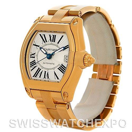 The image shows a Cartier Roadster W62005V1 Men
s Yellow Gold Silver Dial W62005V1 Men
s Yellow Gold Silver Dial model watch from a front-angle view, highlighting the dial, bezel, and part of the bracelet.