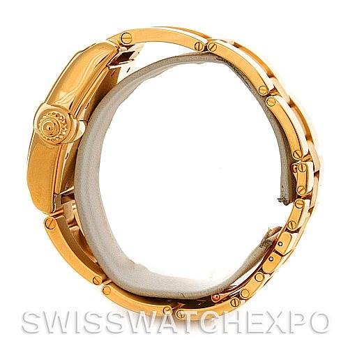 The image shows a side view of the Cartier Roadster W62005V1 Men
s Yellow Gold Silver Dial W62005V1 Men
s Yellow Gold Silver Dial model, displaying the crown and part of the bracelet.