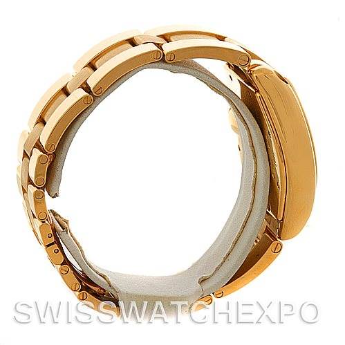 This image shows a side view of a Cartier Roadster W62005V1 Men
s Yellow Gold Silver Dial W62005V1 Men
s Yellow Gold Silver Dial watch highlighting its gold bracelet and clasp.