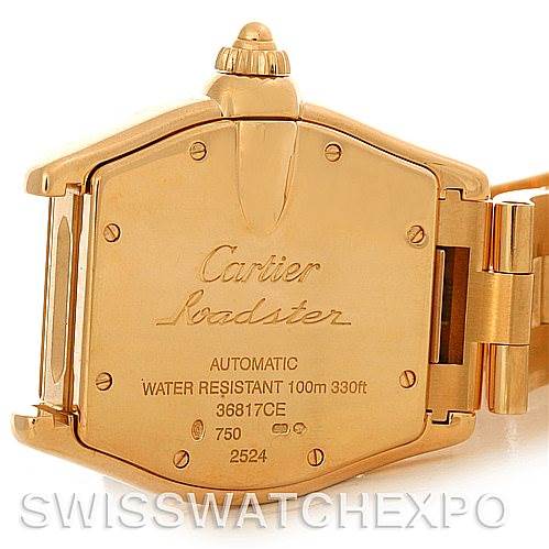 The image shows the back case and part of the bracelet of a Cartier Roadster W62005V1 Men
s Yellow Gold Silver Dial W62005V1 Men
s Yellow Gold Silver Dial watch.