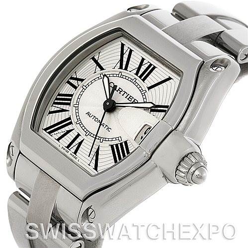 The image shows a close-up angle of a Cartier Roadster W62025V3 Men's Stainless Steel Silver Dial W62025V3 Men's Stainless Steel Silver Dial watch, highlighting the dial, crown, and part of the bracelet.
