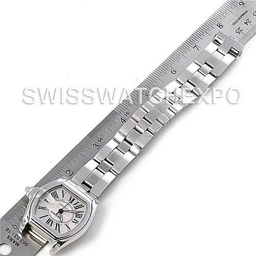 The image shows a top-down view of a Cartier Roadster W62025V3 Men's Stainless Steel Silver Dial W62025V3 Men's Stainless Steel Silver Dial watch with a metal bracelet next to a ruler for measurement.