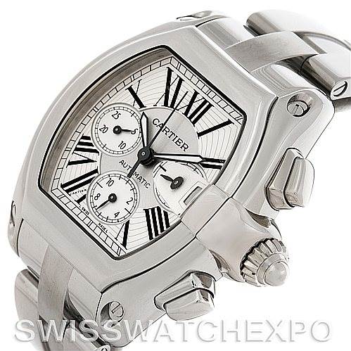 The image shows a close-up angle of the Cartier Roadster W62019X6 Men's Stainless Steel Silver Dial W62019X6 Men's Stainless Steel Silver Dial model watch, highlighting its dial, crown, and part of the bracelet.