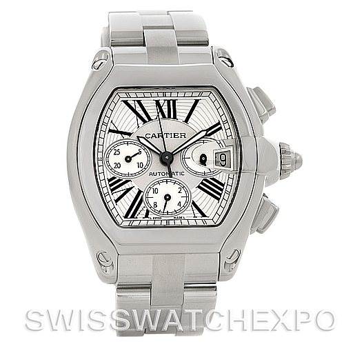 The image shows a Cartier Roadster W62019X6 Men's Stainless Steel Silver Dial W62019X6 Men's Stainless Steel Silver Dial watch with a front view, featuring its silver dial, Roman numerals, chronograph sub-dials, and date window.