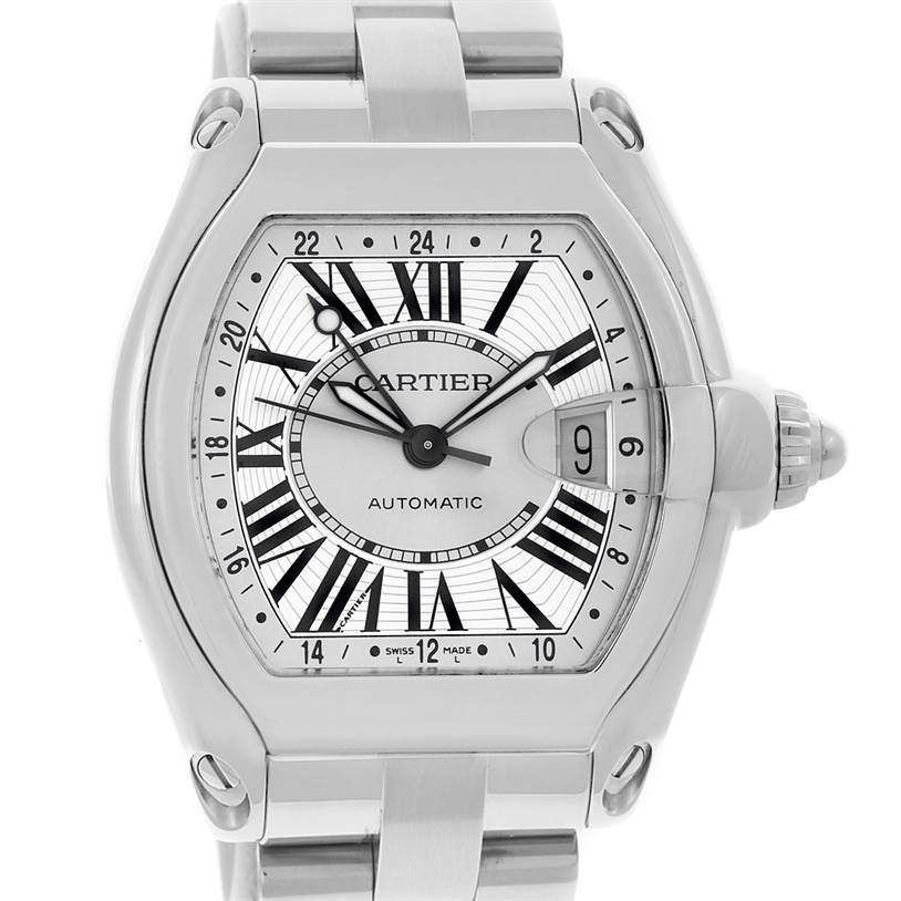 The image shows a front view of the Cartier Roadster W62032X6 Men's Stainless Steel Silver Dial W62032X6 Men's Stainless Steel Silver Dial watch, detailing its face, Roman numerals, date window, and metal bracelet.