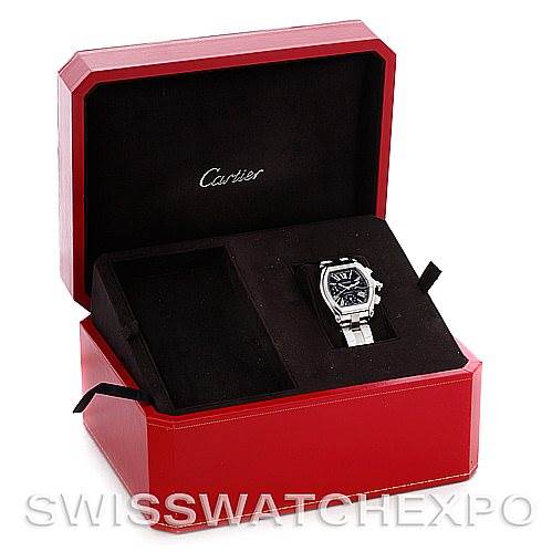 The image shows a Cartier Roadster W62020X6 Men's Stainless Steel Black Dial W62020X6 Men's Stainless Steel Black Dial watch displayed at an angle inside an open Cartier-branded red box.