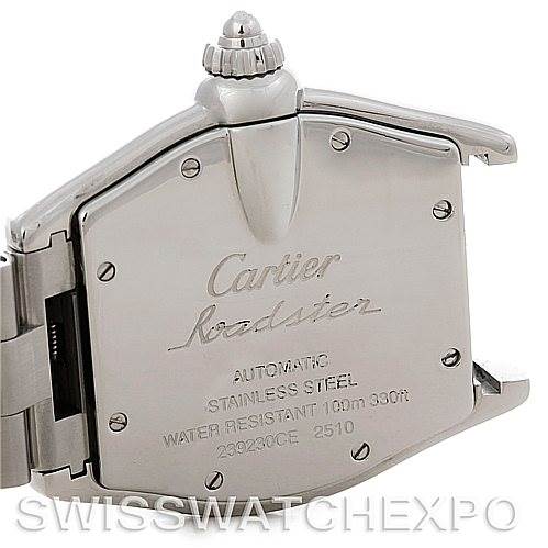 The image shows a close-up of the back case and crown of a Cartier Roadster W62025V3 Men's Stainless Steel Silver Dial W62025V3 Men's Stainless Steel Silver Dial watch.