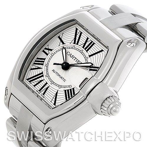 The image shows a close-up of a Cartier Roadster W62025V3 Men's Stainless Steel Silver Dial W62025V3 Men's Stainless Steel Silver Dial watch at an angle, highlighting the dial, crown, and part of the bracelet.