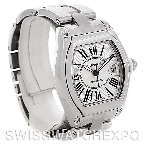 The image shows a Cartier Roadster W62025V3 Men's Stainless Steel Silver Dial W62025V3 Men's Stainless Steel Silver Dial watch from a front-left angle, displaying its case, bracelet, and dial with Roman numerals.
