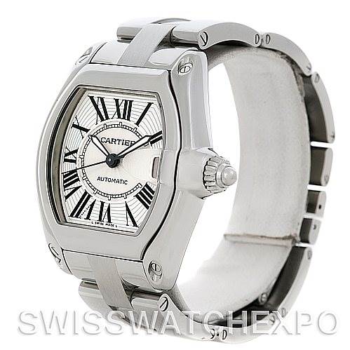 This image shows a Cartier Roadster W62025V3 Men's Stainless Steel Silver Dial W62025V3 Men's Stainless Steel Silver Dial watch from a three-quarter side angle, highlighting the dial, crown, and part of the strap.