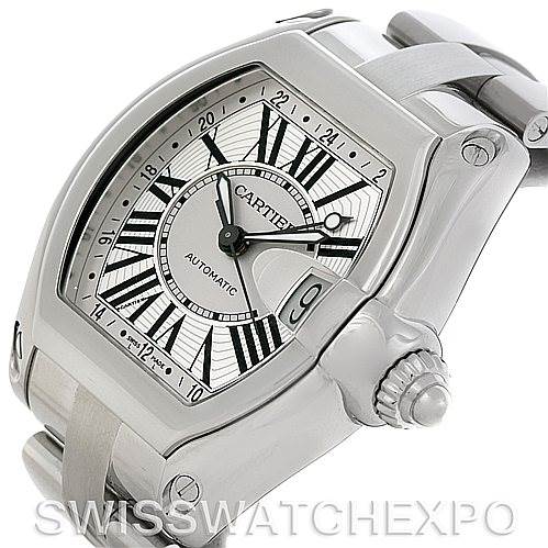 The image shows a Cartier Roadster W62032X6 Men's Stainless Steel Silver Dial W62032X6 Men's Stainless Steel Silver Dial watch at an angle highlighting the watch face, crown, and part of the bracelet.
