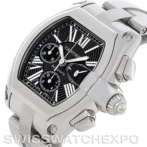 The image shows a Cartier Roadster W62020X6 Men's Stainless Steel Black Dial W62020X6 Men's Stainless Steel Black Dial watch from an angled side view, highlighting its dial, crown, and portion of the bracelet.