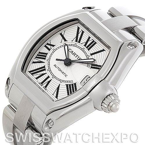 The image shows a Cartier Roadster W62025V3 Men
s Stainless Steel Silver Dial W62025V3 Men
s Stainless Steel Silver Dial watch from an angled top view, highlighting the face, bracelet, and crown.