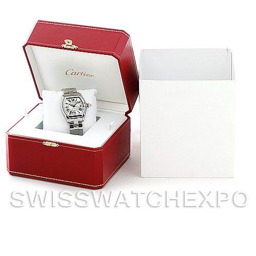 The image shows a Cartier Roadster W62025V3 Men's Stainless Steel Silver Dial W62025V3 Men's Stainless Steel Silver Dial watch in an open red display box, accompanied by an outer white box.
