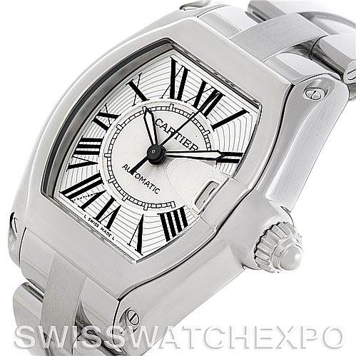 The image shows Cartier Roadster W62025V3 Men's Stainless Steel Silver Dial W62025V3 Men's Stainless Steel Silver Dial watch from an angled view, highlighting the dial, crown, and part of the bracelet.