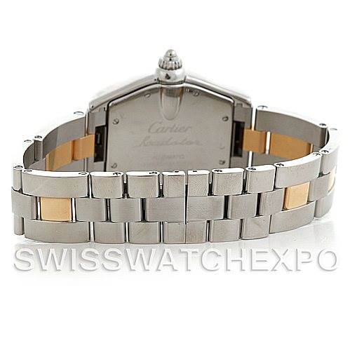 The image shows the back of a Cartier Roadster W62031Y4 Men's Steel and Gold (two tone) Silver Dial W62031Y4 Men's Steel and Gold (two tone) Silver Dial watch, focusing on its case back and two-tone metal bracelet.