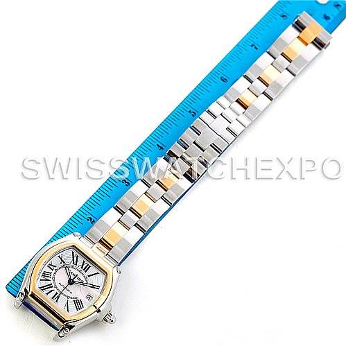 The Cartier Roadster W62031Y4 Men's Steel and Gold (two tone) Silver Dial W62031Y4 Men's Steel and Gold (two tone) Silver Dial watch is shown from a top-down angle, highlighting the face and the full length of the metal band.