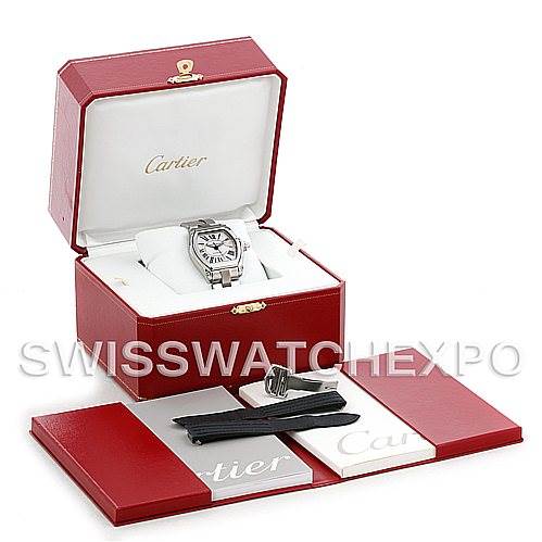 The Cartier Roadster W62025V3 Men's Stainless Steel Silver Dial W62025V3 Men's Stainless Steel Silver Dial watch is shown inside its box, with additional straps, deployment clasp, and booklets presented outside.
