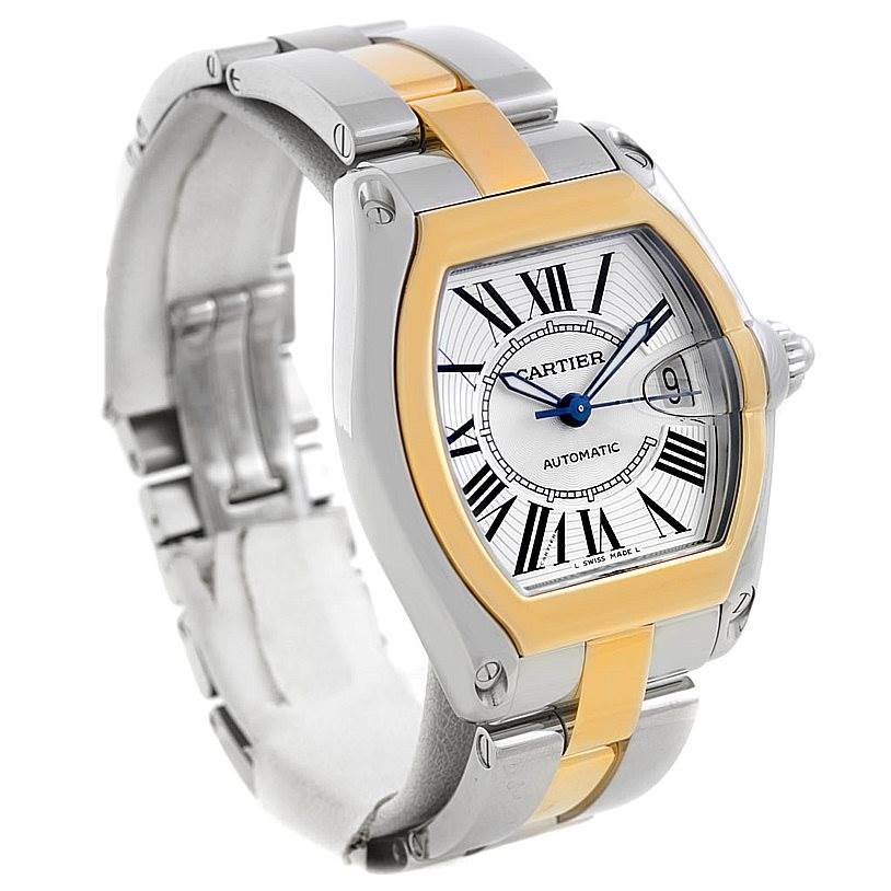 This image shows a Cartier Roadster W62031Y4 Men's Steel and Gold (two tone) Silver Dial W62031Y4 Men's Steel and Gold (two tone) Silver Dial watch at a three-quarter angle, highlighting its dial, bracelet, and case.