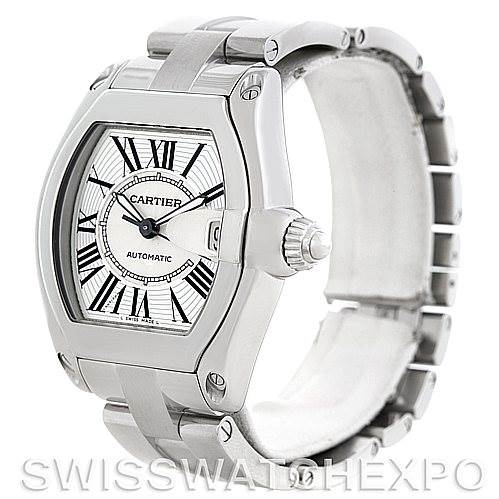 This image shows a Cartier Roadster W62025V3 Men's Stainless Steel Silver Dial W62025V3 Men's Stainless Steel Silver Dial watch at an oblique angle, highlighting its face, crown, and part of the metal bracelet.